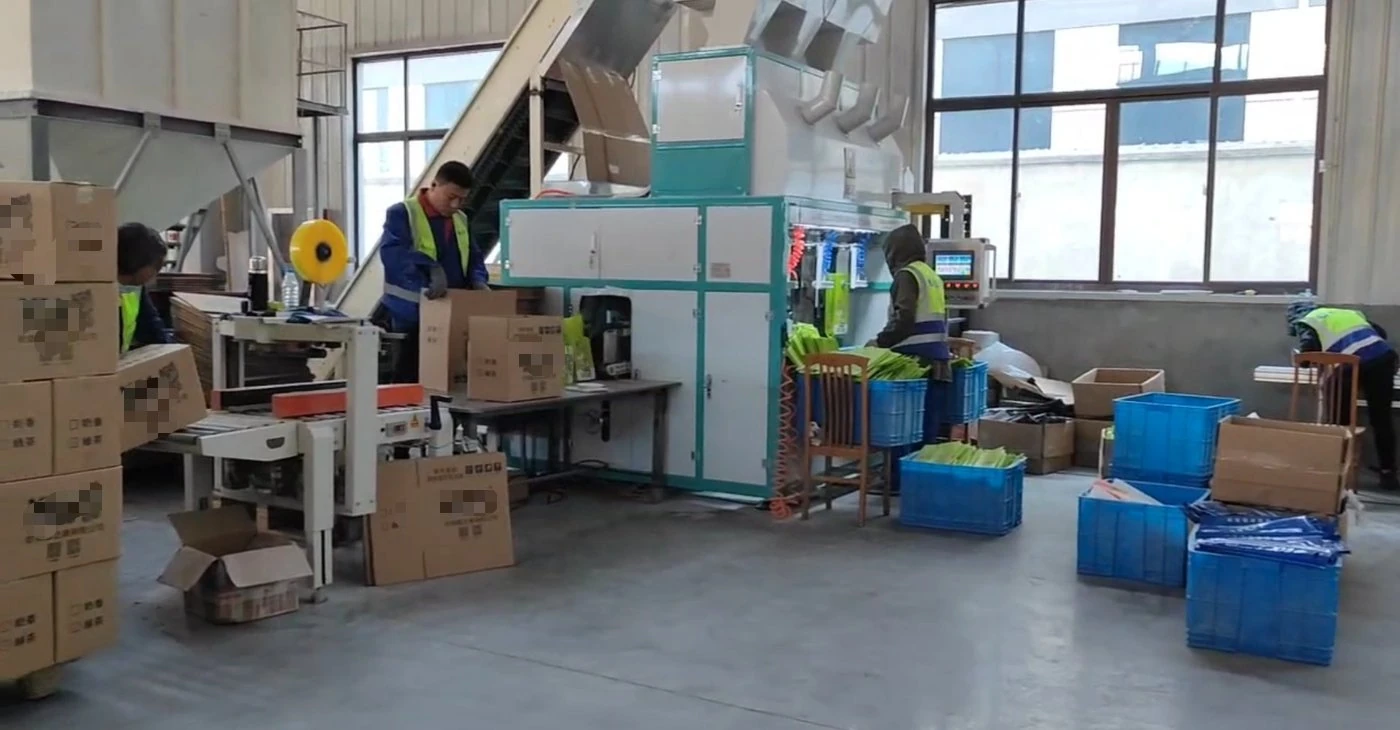 Automated packaging and filling line for cat litter production