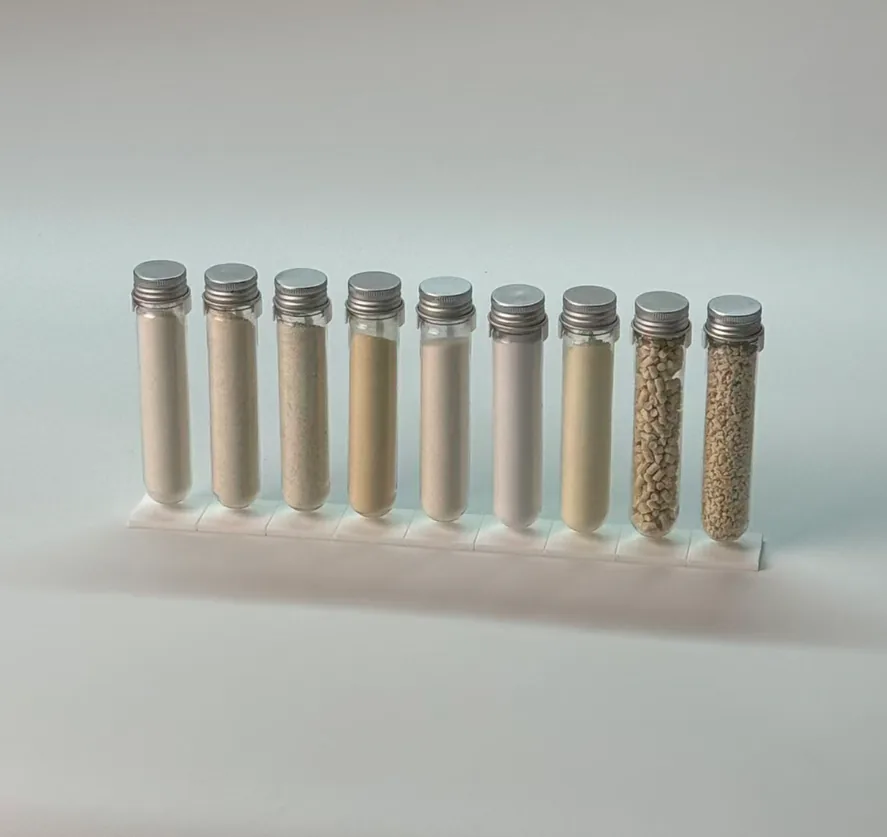 Gormeet raw material samples displayed in test tubes - pea fiber, corn starch, cassava starch, bentonite